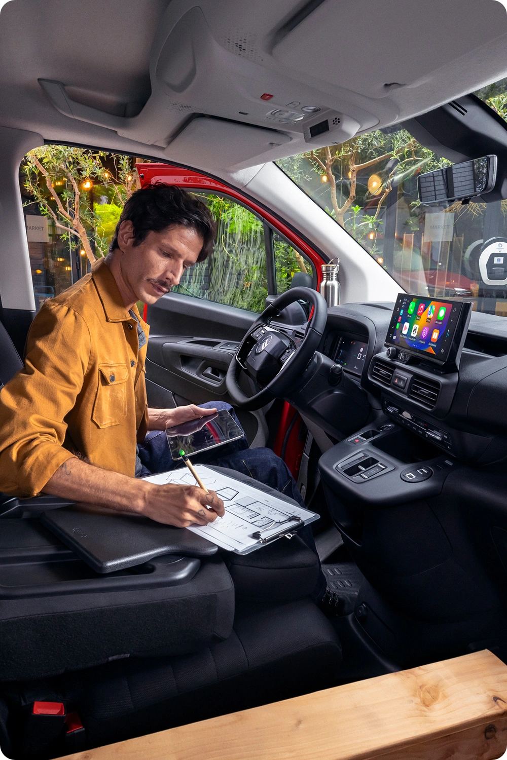 Close-up view of the Citroën ë-C3 Van cargo compartment, highlighting the practical load space and protective interior lining.