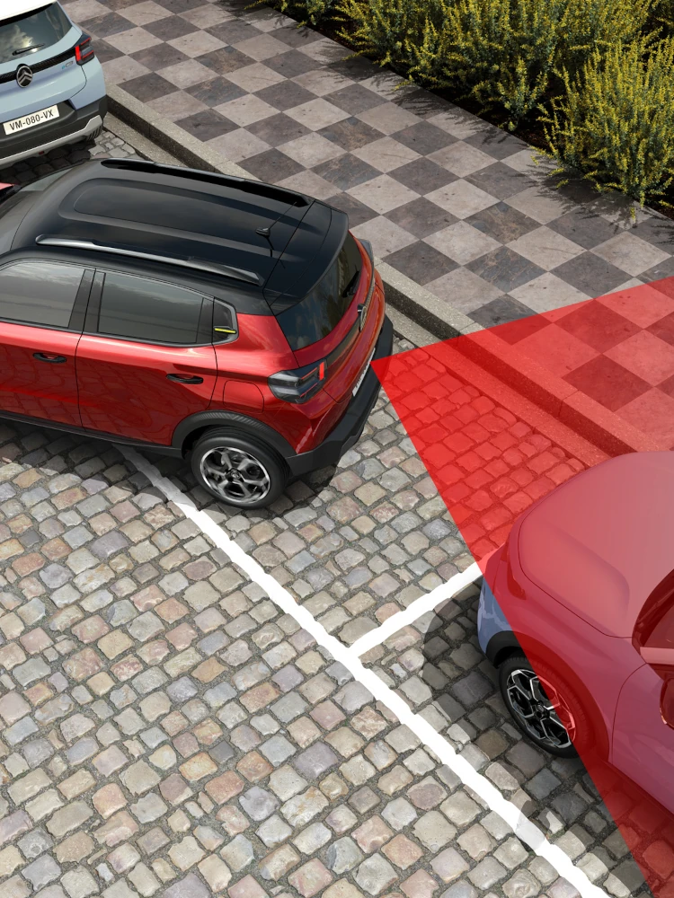 Vue de dessus du SUV électrique Citroën ë-C3 montrant des capteurs de stationnement arrière pour une manœuvre urbaine plus sûre, confiante et abordable.