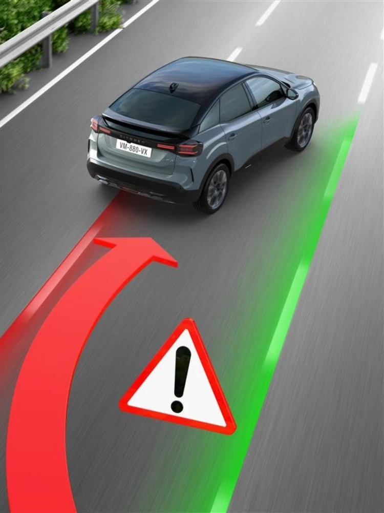 Vue arrière à trois quarts ë-C4 avec alerte de sortie de voie améliorant la sécurité, la visibilité, l’efficacité et un maintien de voie confiant